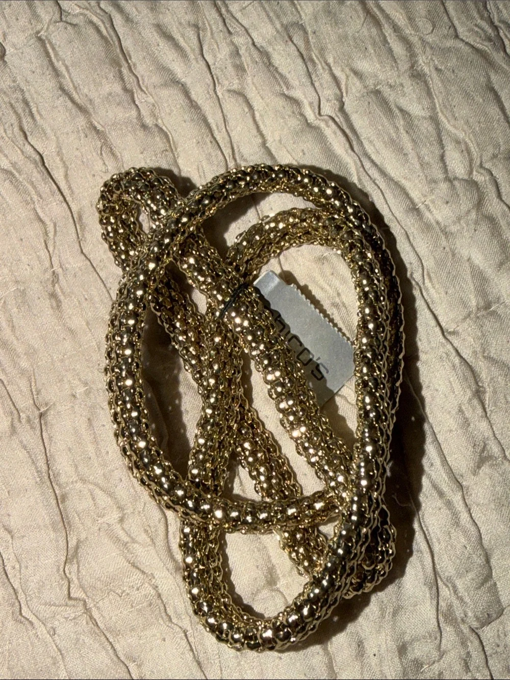Set of three new with tags gold tone bracelet stretch